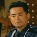 Woo Gwong as a cop