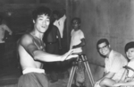 behind the scenes of a deleted scene <br> (which could be found in a Mandarin print and thus was included in a longer version of THE BIG BOSS, released by Arrow Films in July 2023) – The only studio scene for THE BIG BOSS was shot on 4th September 1971, two days after finishing filming in Thailand, at the Wader Studio in Hong Kong (Golden Harvest was still months away from acquiring the use of the Yung Hwa Studio at Hammer Hill). Here you see Bruce Lee being visited by his cousin Lee Fat-Chee and his wife Ng Suk-Ying.