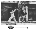US lobby card for THE THUNDER KICK <br> (mistakenly displaying a still from FIST TO FIST which was released by the same distributor, Cannon Films)