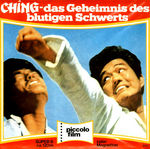 German Super 8 release (one-parter)/scan of box front with
a mistaken still from IRON-PUNCH CONTEST