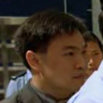 Cop arresting Ka Fu