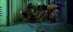 Policemen dressed as frogman beating suspect in prologue