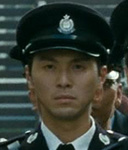 Police Officer at Billy's funeral ceremony