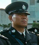 Police Officer at Billy's funeral ceremony
