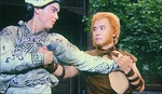 Wai An's younger brother Nai Cha in disguise, with the Monkey King