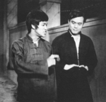 deleted scene <br> (which could be found in a Mandarin print and thus was included in a longer version of THE BIG BOSS, released by Arrow Films in July 2023) – This only studio scene was shot on 4th September 1971 two days after finishing filming in Thailand. Finally, the so-called (to some sources) 