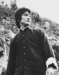 some kind of a deleted scene<br> (in the final version of ENTER THE DRAGON Bruce Lee doesn't look back – maybe to Bolo on the quay)