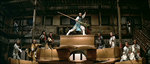 Johnny Wang atop a pyramid of coffins as the finale begins