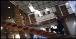 Michelle Yeoh in mid-flight towards a soon to be hurting Dick Wei.