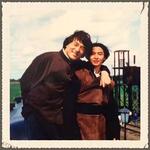 Behind the scenes photo of Jackie Chan and 