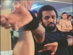 Dennis Brown as Sifu Daniel, according to the VCD