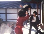 Kim Doo-han performing a flying side kick.