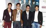 Tony Leung Ka-Fai, co-directors Sunny Luk and Longman Leung, and actor Aaron Kwok pose for photographs after a press conference in Busan, South Korea